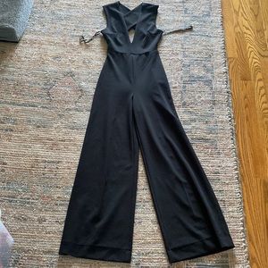 Black cross back and deep V jumpsuit